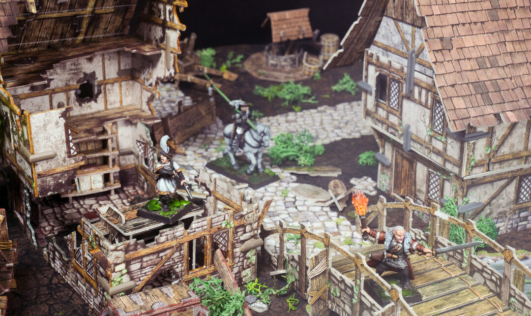 A frrelance knight and members of his warband hold a choke point in Mordheim terrain