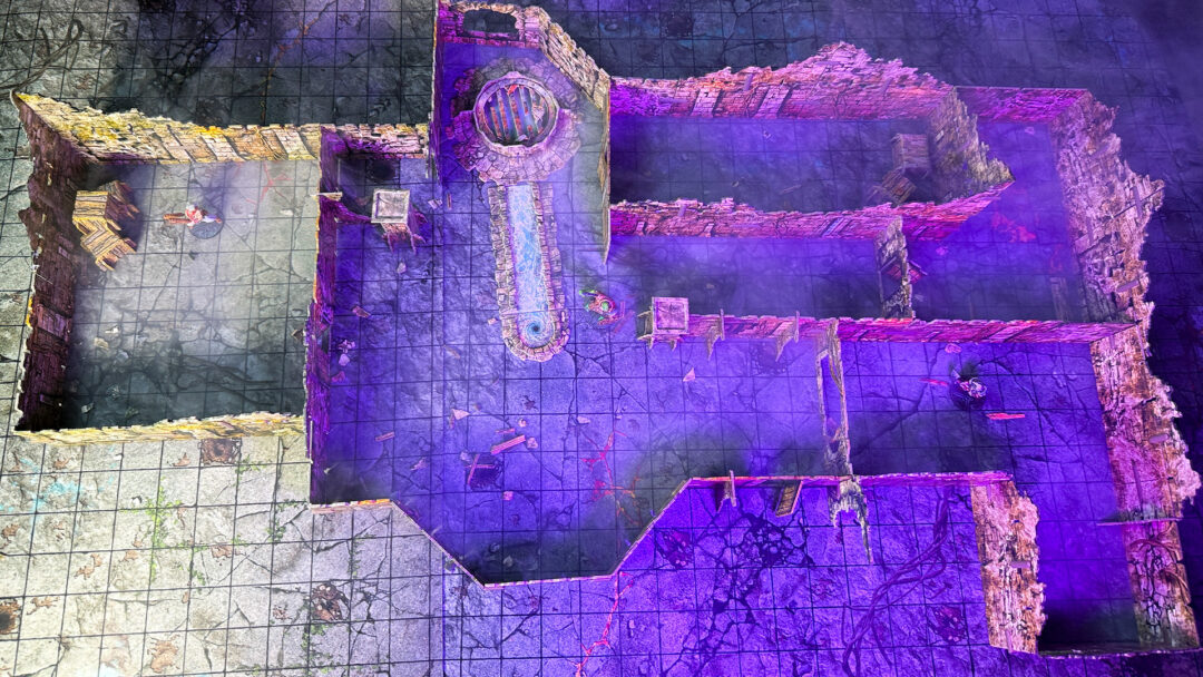 Top down view of the mephit lair, created using 3D terrain and inspired by the Cave B of the Caves of Chaos quest from the Heroes of the Borderlands D&D starter set.
